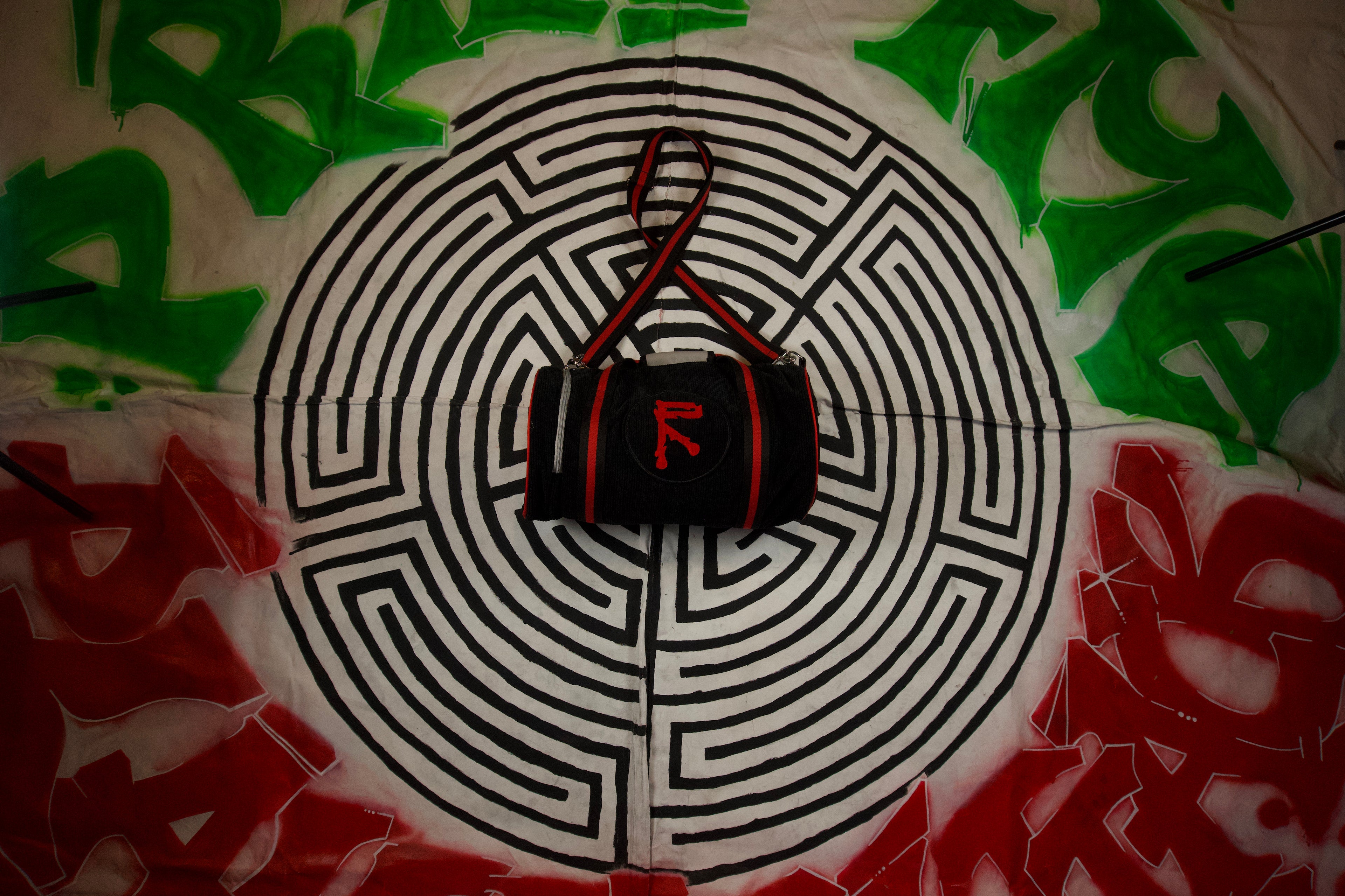 'Agonized' corduroy duffel bag