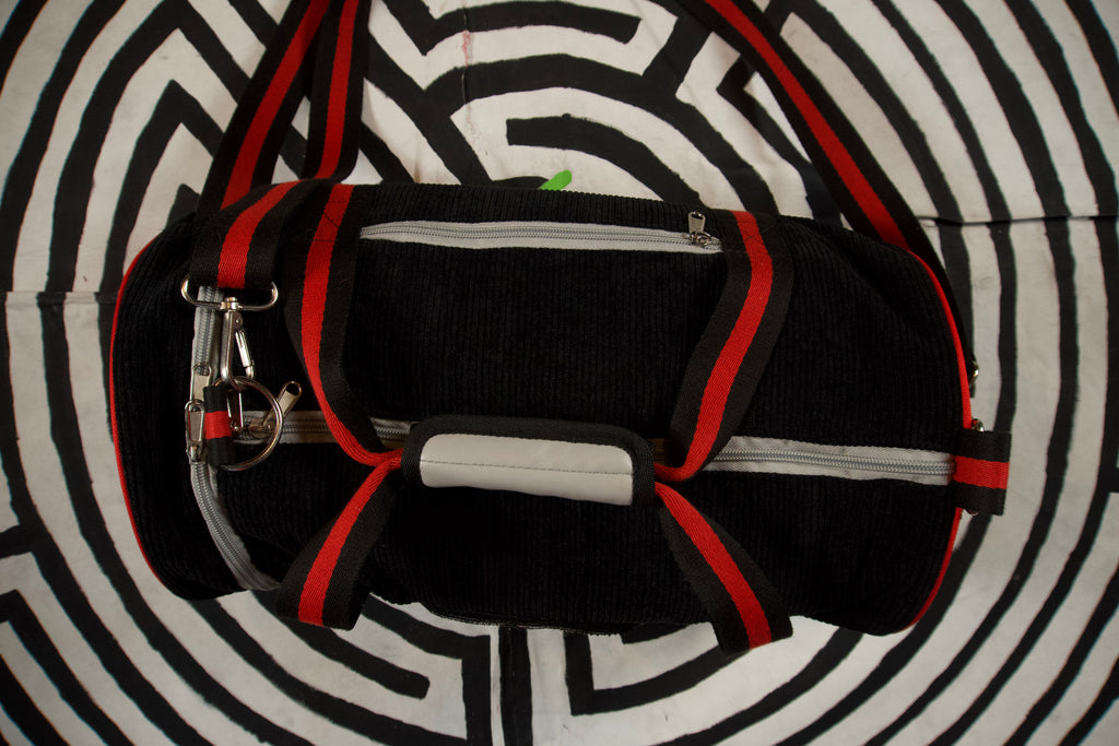 'Agonized' corduroy duffel bag