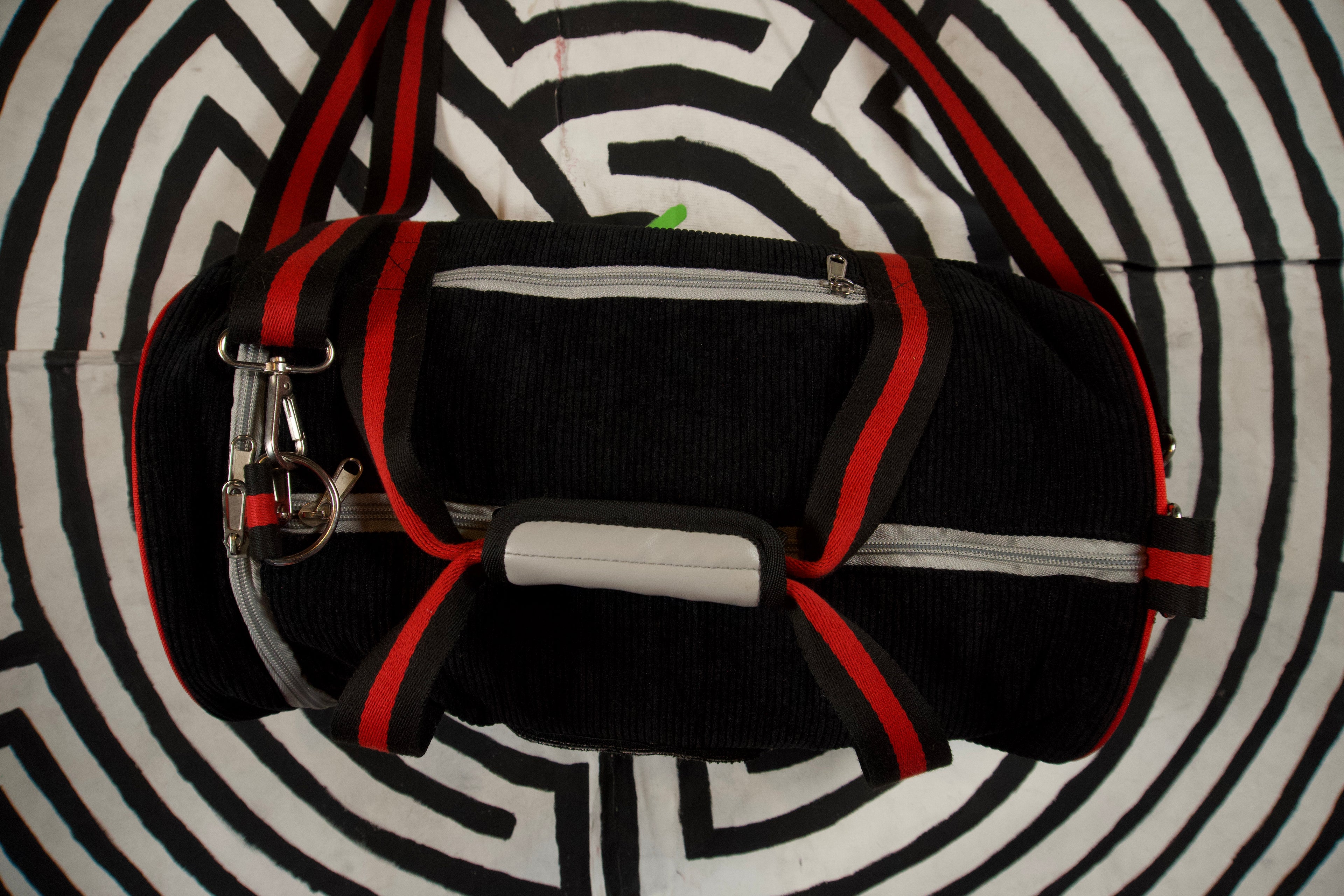 'Agonized' corduroy duffel bag
